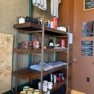 a shelf of coffee and other items