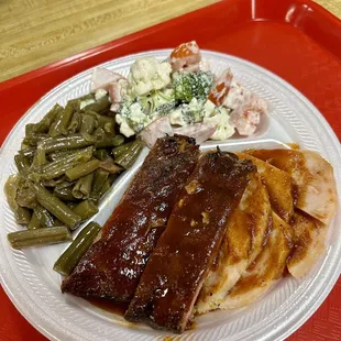 ribs and turkey (processed). Green beans and brocolli and cauliflower salad. Pretty sure I got food poisoning from the salad.
