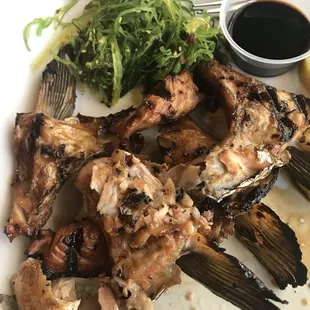 a plate of grilled fish