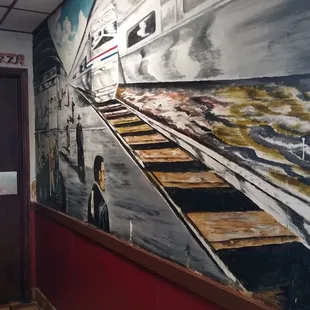 Murial in the hallway to Restrooms.