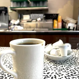 a cup of coffee on a table