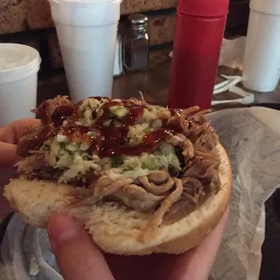 ows a pulled pork sandwich