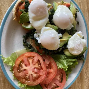 2 servings of Veggie Benedict eggs (Spinach, avocado...) slices of tomato for sides