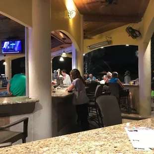 Poolside lounge open air bar area.