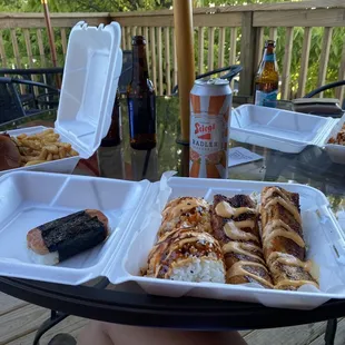 Big Kahuna Burger with fries (left), Spam Musubi and Mahi Mahi with rice (middle), Salmon with rice (right)