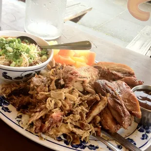 Kalua pig, grilled chicken with a side of fruit salad and big kahuna chili