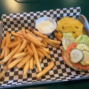 Cheeseburger with a not so generous portion of fries.