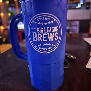 a blue mug on a table