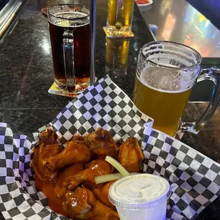 Love the wings, Many taps to choose from.  Bar seating, large tables  Place is big for large gatherings.