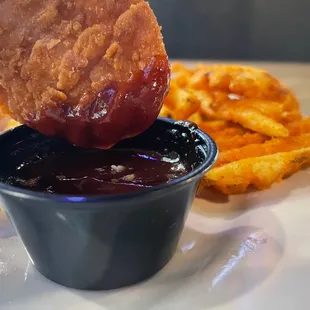Seasoned Waffle Fries, Chicken Strips, and Barbecue Sauce