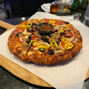 Supreme. Half off pizzas dine in Monday's