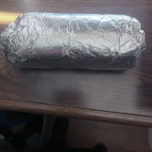 Burrito almost hand held. Will not break apart.