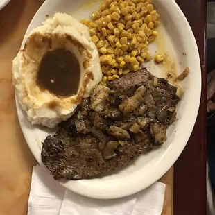 Smothered liver and onions, mashed potatoes with gravy, corn.