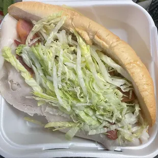 The west coast sub- turkey, smoked applewood bacon, mayo, onion, lettuce (ordered my without tomato), on a philly roll