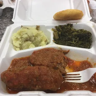 a meal in a styrofoam container