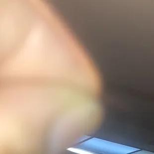 Reddish brown curly hair in fries