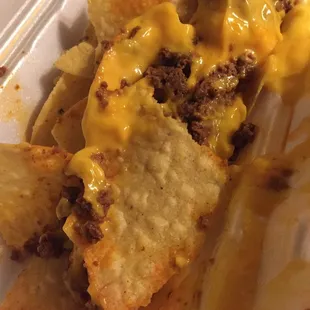 Nachos with beef in the to-go box. This was about $4. Box tipped a little