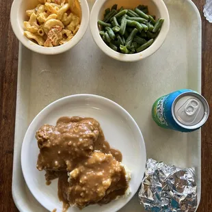 Smothered chicken, crawfish macaroni, green beans, cornbread.