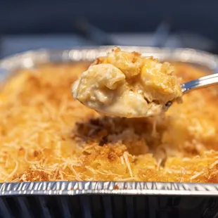 a spoon full of macaroni and cheese