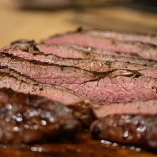 sliced steak on a cutting board