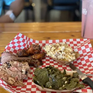 Pulled pork, collard green, brisket and potato salad