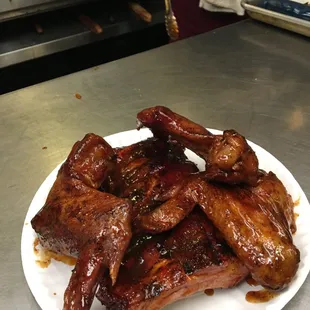 Saturday special 1/2 rack of ribs and wings. we serve full wings, do not cut them in half.