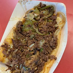 Original cheesesteak with mushrooms, green peppers, and onions.