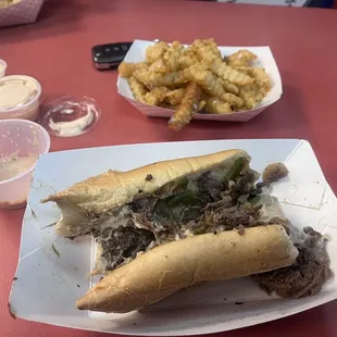 Philly cheesesteak with garlic fries