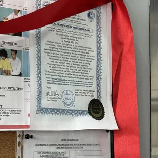 a certificate on a bulletin board
