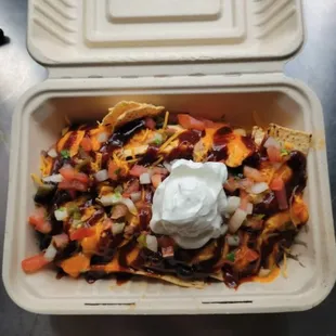 nachos in a styrofoam container
