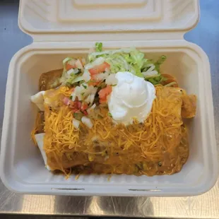 a close up of a taco in a styrofoam container