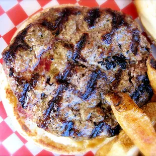 Well charred, yet very juicy. More mouth watering pics here: http://bangforyourburgerbuck.com/big-mouth-burgers-san-francisco-ca/
