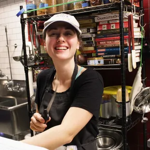 a woman in a kitchen