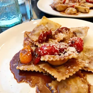 Homemade ravioli stuffed with beef and topped with a life-changing sauce.