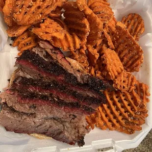 Brisket sandwich with sweet potato fries