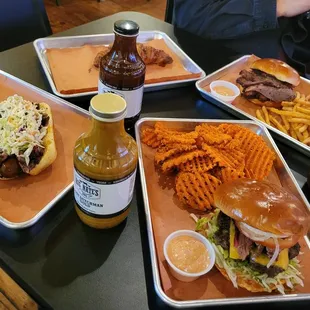 Crookie (hidden), brisket sandwich w/ classic fries, single burger + brisket w/ sweet potato criss cut fries, and NATE Dawg w/ brisket.