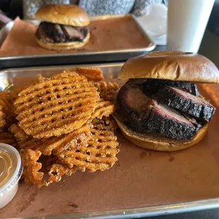 Brisket sandwich and sweet potato fries