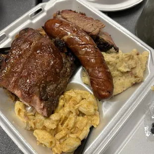 Big Nate plate, loaded Mash potatoes, Mac &amp; Cheese, ribs, pulled pork, brisket, bbq chicken.