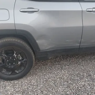 Rear wheel, rear door and front door damage