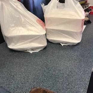 two bags of food on the counter