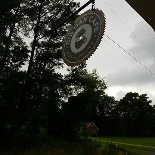 a clock hanging from the side of a building