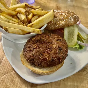 a burger and french fries on a plate