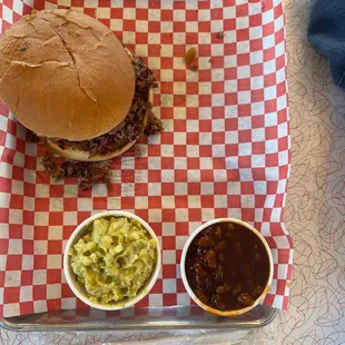 Beans, potato salad, and chopped brisket.