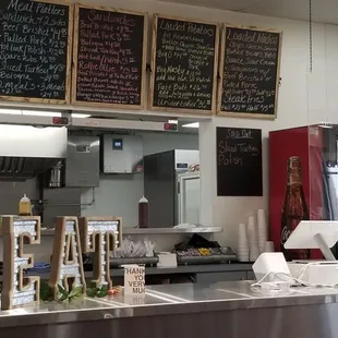 a view of a restaurant counter
