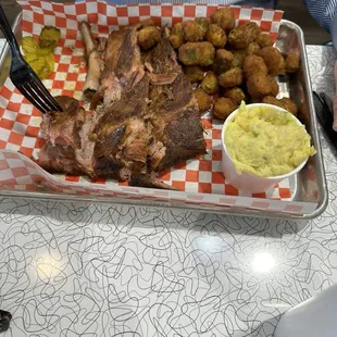 Ribs, yellow potato salad and fries okra