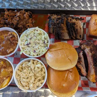 Peach cobbler, coleslaw, Mac n cheese, brisket, pulled pork corn bread. All delicious!