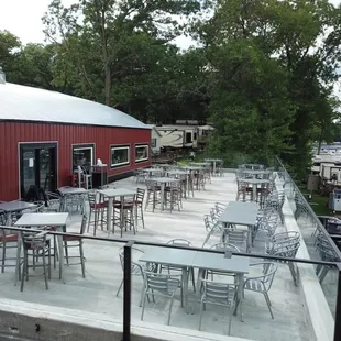 patio area with tables and chairs