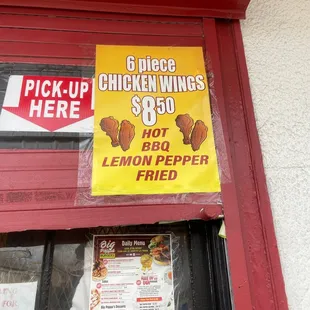 a chicken wings sign