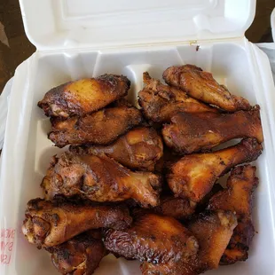 chicken wings in a styrofoam container