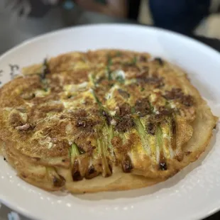 Seafood pancake. Not your typical Korean pancake batter but it is sooooo good. Highly recommend.